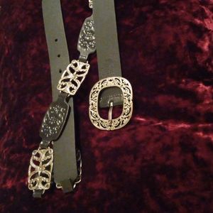 Women's Lg. Black Leather and metal belt.